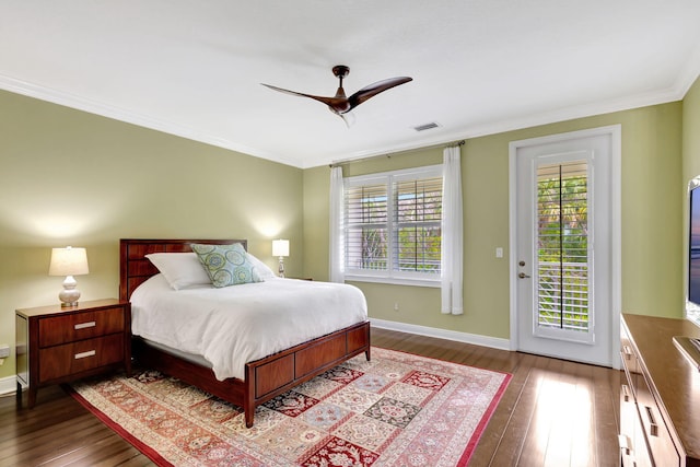 bedroom with multiple windows, visible vents, access to outside, and hardwood / wood-style floors