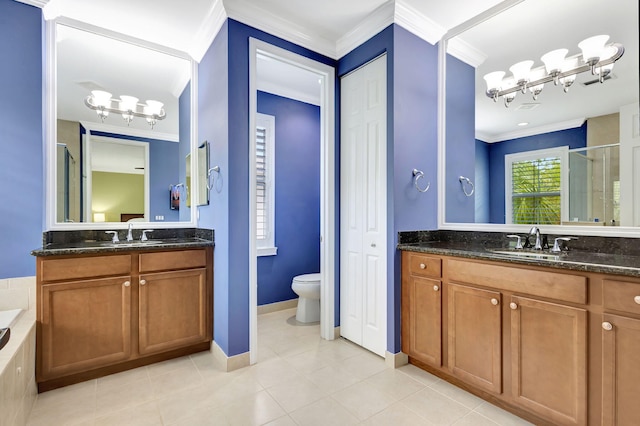 bathroom featuring a chandelier, tile patterned flooring, a sink, and crown molding