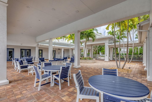 view of patio / terrace with outdoor dining area and fence