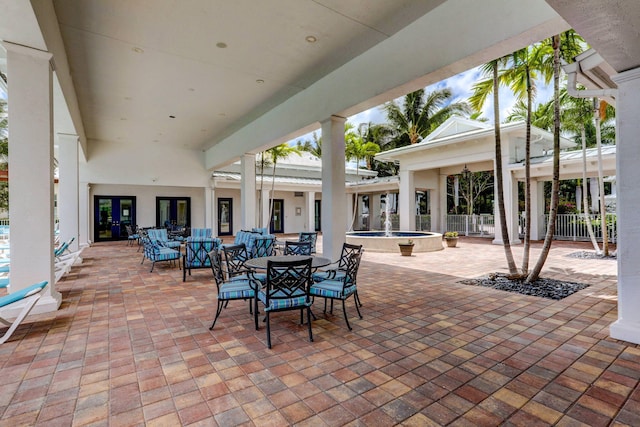 view of patio / terrace with outdoor dining area and fence