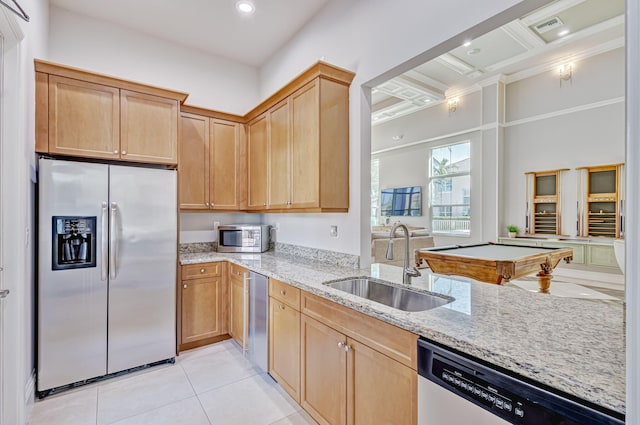 kitchen with light stone counters, light tile patterned floors, visible vents, stainless steel appliances, and a sink