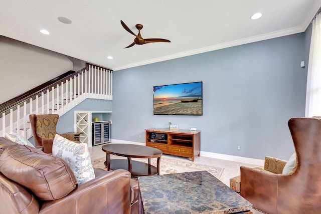 living room with recessed lighting, ornamental molding, a ceiling fan, and stairs