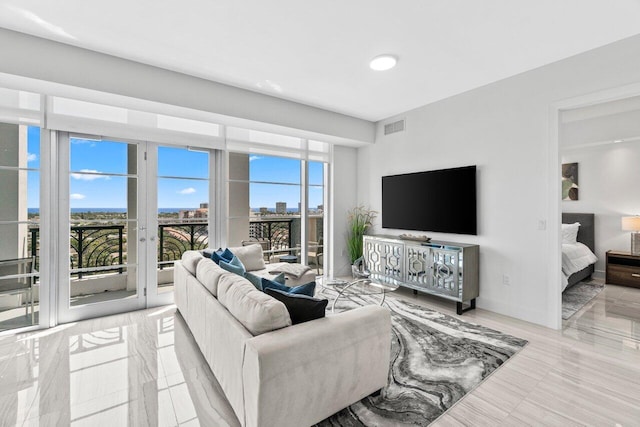 living area featuring visible vents
