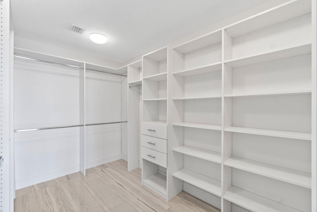 spacious closet with visible vents and light wood finished floors