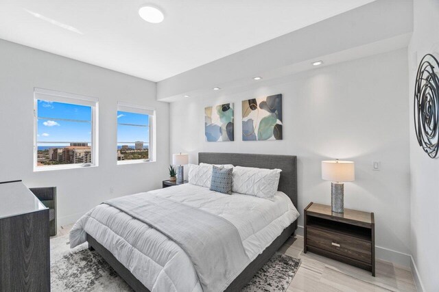 bedroom with baseboards and recessed lighting