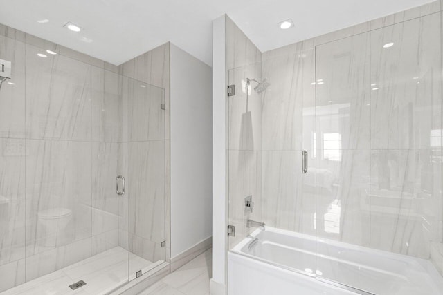 bathroom featuring marble finish floor, baseboards, and recessed lighting