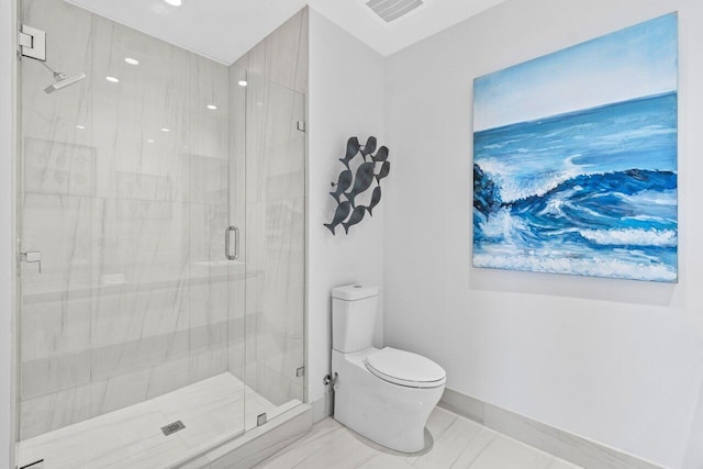 bathroom with a shower stall, visible vents, toilet, and baseboards