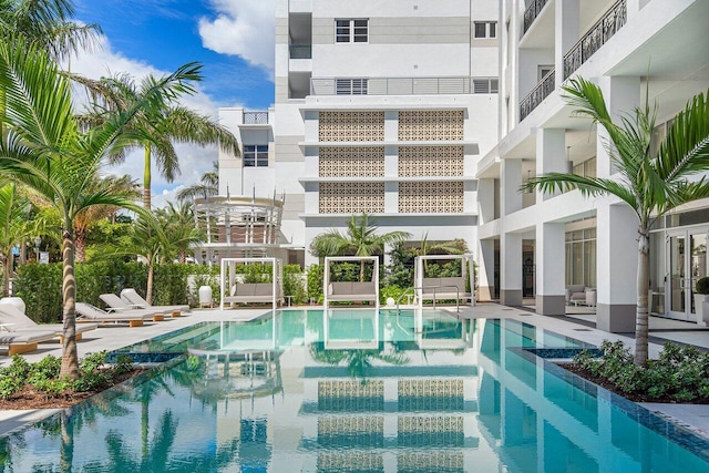 pool featuring a patio area