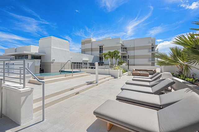 view of patio featuring a community pool
