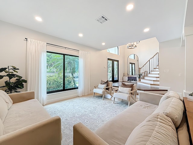 living area with visible vents, recessed lighting, and a wealth of natural light