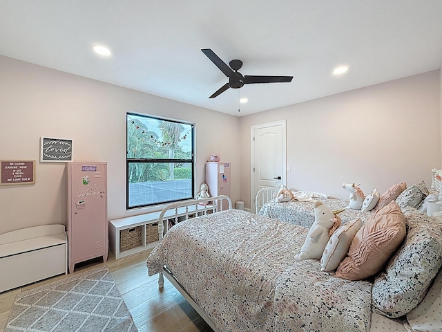 bedroom with recessed lighting, a ceiling fan, and light wood-style floors