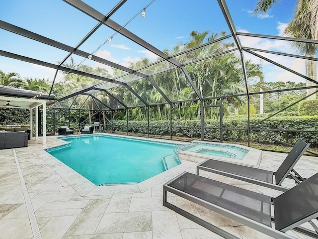 view of pool featuring a patio and a pool with connected hot tub