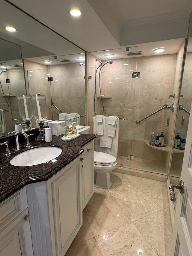 434 Chilean Ave Unit 2B, Palm Beach, FL 33480 - full bath featuring toilet, vanity, ornamental molding, tile patterned floors, and a shower stall