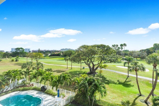 surrounding community featuring a yard and fence