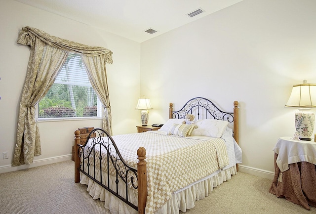 bedroom featuring carpet floors and baseboards