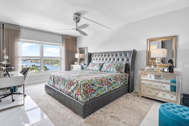 400 Seasage Dr Unit 804, Delray Beach, FL 33483 - bedroom with ceiling fan, tile patterned flooring, and a water view