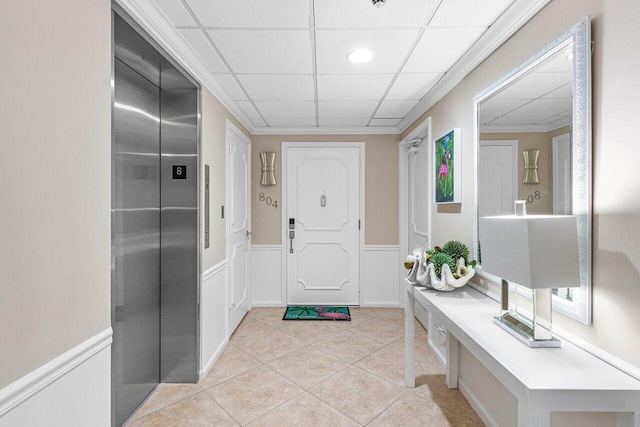 400 Seasage Dr Unit 804, Delray Beach, FL 33483 - entrance foyer with light tile patterned flooring, elevator, a wainscoted wall, and recessed lighting