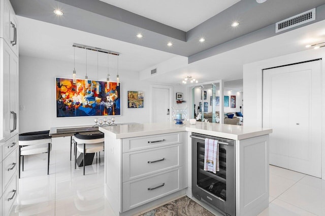 400 Seasage Dr Unit 804, Delray Beach, FL 33483 - bar featuring wine cooler, visible vents, recessed lighting, and hanging light fixtures