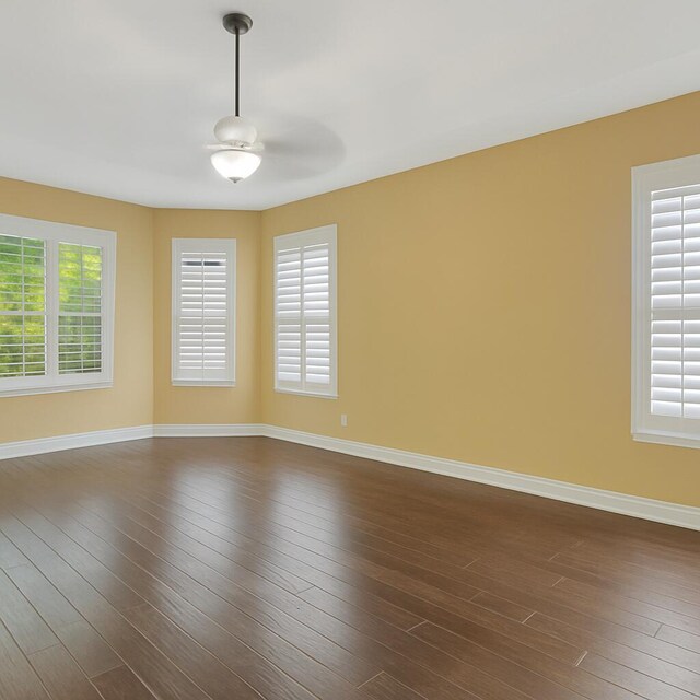 21504 Halstead Dr, Boca Raton, FL 33428 - kitchen with stainless steel dishwasher, a sink, ceiling fan, dark brown cabinetry, and light tile patterned flooring