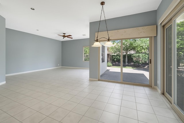 21504 Halstead Dr, Boca Raton, FL 33428 - empty room with light tile patterned floors, baseboards, and a ceiling fan