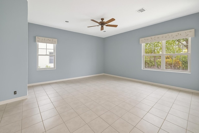 21504 Halstead Dr, Boca Raton, FL 33428 - unfurnished room featuring plenty of natural light, a ceiling fan, and baseboards