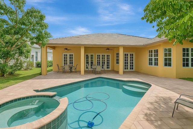 21504 Halstead Dr, Boca Raton, FL 33428 - rear view of property with french doors, a ceiling fan, a patio area, a pool with connected hot tub, and stucco siding