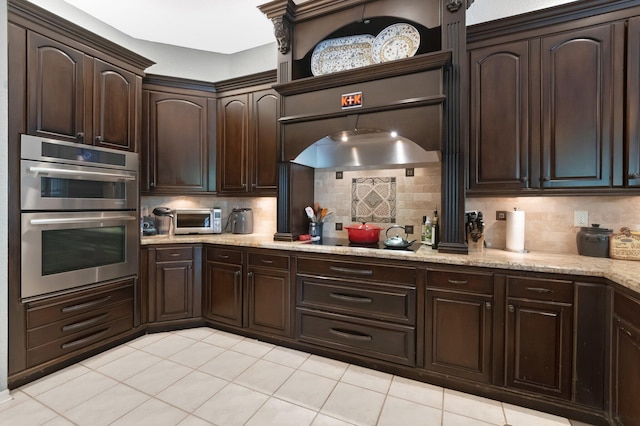 21504 Halstead Dr, Boca Raton, FL 33428 - kitchen featuring double oven, black electric cooktop, dark brown cabinetry, and tasteful backsplash