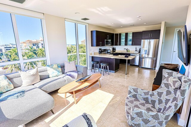 living area featuring visible vents