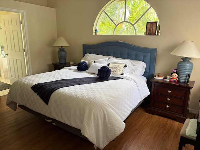 bedroom with wood finished floors