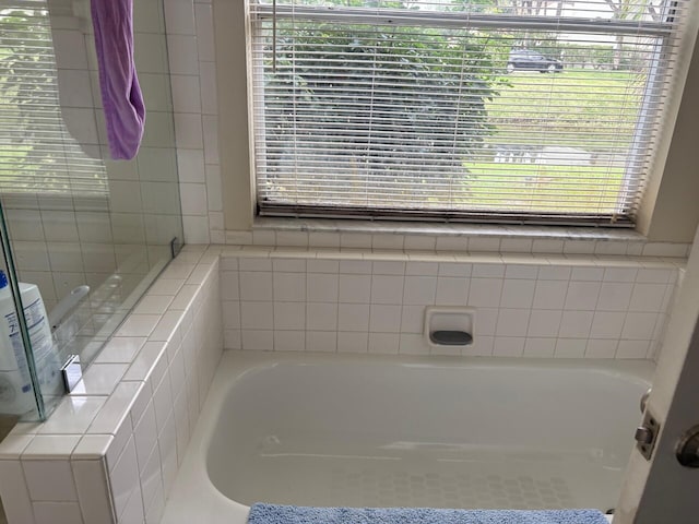 bathroom featuring a garden tub
