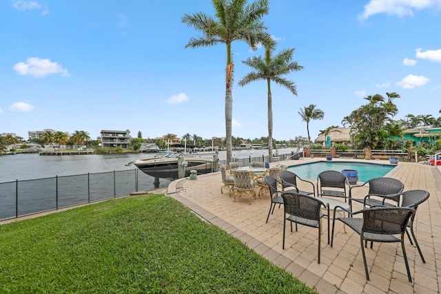 442 SE 17th Ter, Deerfield Beach, FL 33441 - view of swimming pool featuring a water view, fence, a fenced in pool, and a yard