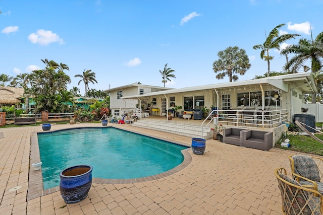 442 SE 17th Ter, Deerfield Beach, FL 33441 - outdoor pool featuring a patio area, outdoor lounge area, and fence