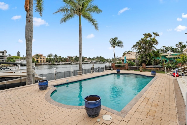 442 SE 17th Ter, Deerfield Beach, FL 33441 - view of pool featuring a water view, fence, a fenced in pool, and a patio area
