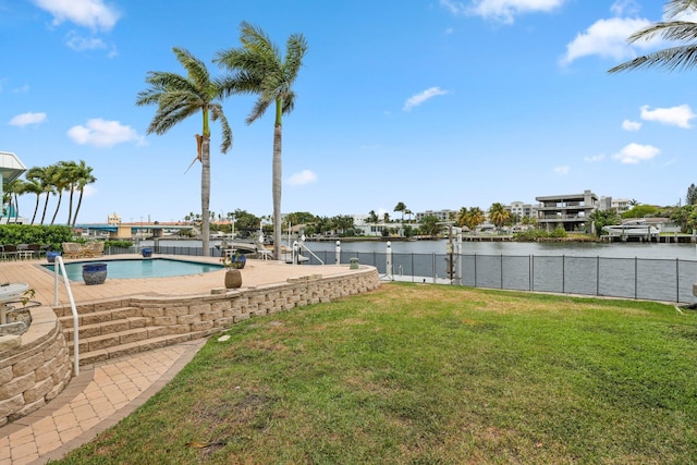 442 SE 17th Ter, Deerfield Beach, FL 33441 - view of yard featuring a water view, fence, and a fenced in pool