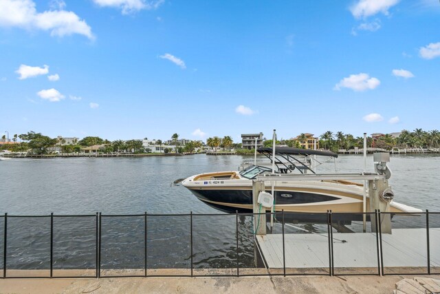 442 SE 17th Ter, Deerfield Beach, FL 33441 - view of dock featuring a water view and boat lift