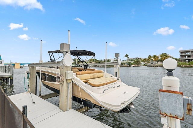 442 SE 17th Ter, Deerfield Beach, FL 33441 - dock area with a water view and boat lift