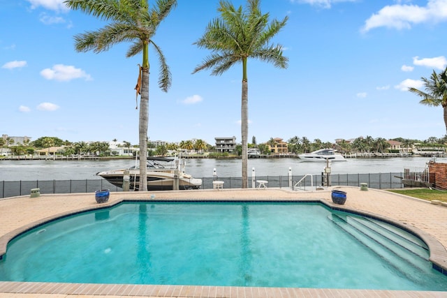442 SE 17th Ter, Deerfield Beach, FL 33441 - view of swimming pool featuring a water view, boat lift, a boat dock, and fence