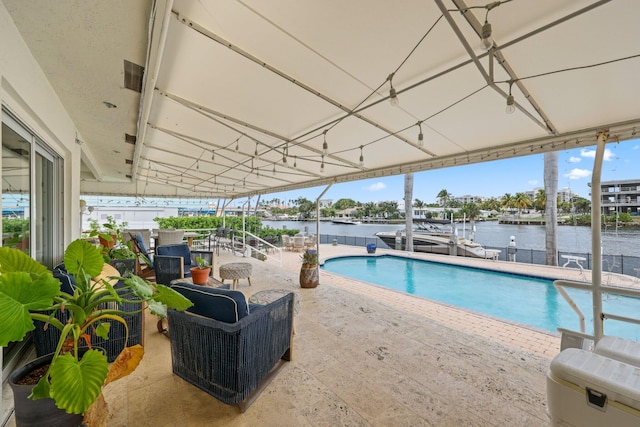 442 SE 17th Ter, Deerfield Beach, FL 33441 - view of swimming pool with a water view, a boat dock, boat lift, and a patio area