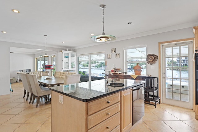 442 SE 17th Ter, Deerfield Beach, FL 33441 - kitchen featuring light tile patterned floors, dishwasher, a sink, and light brown cabinetry