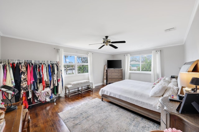 442 SE 17th Ter, Deerfield Beach, FL 33441 - bedroom with ceiling fan, ornamental molding, visible vents, wood finished floors, and baseboards