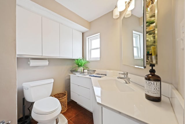 442 SE 17th Ter, Deerfield Beach, FL 33441 - bathroom featuring toilet, tile patterned flooring, and vanity