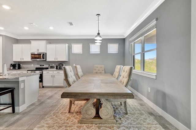 6449 NW Castlebrook Ave, Port Saint Lucie, FL 34983 - dining space with visible vents, ornamental molding, and recessed lighting