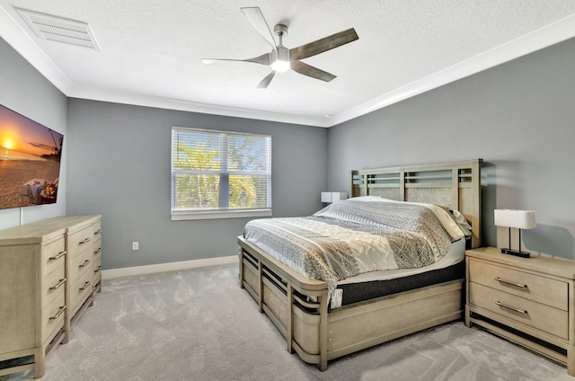 6449 NW Castlebrook Ave, Port Saint Lucie, FL 34983 - bedroom featuring visible vents, baseboards, ceiling fan, light colored carpet, and a textured ceiling