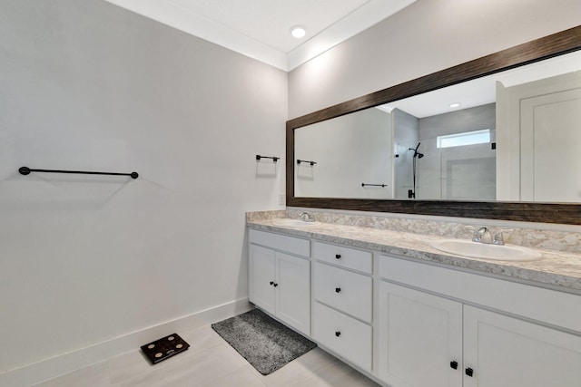6449 NW Castlebrook Ave, Port Saint Lucie, FL 34983 - bathroom featuring a sink, tile patterned flooring, a shower stall, and double vanity