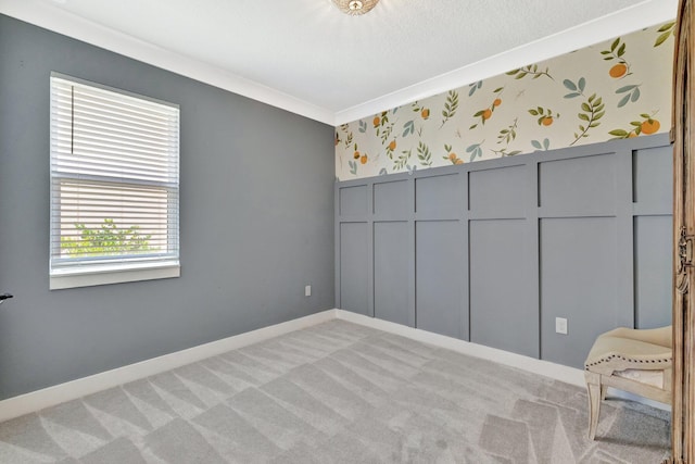 6449 NW Castlebrook Ave, Port Saint Lucie, FL 34983 - unfurnished room with light colored carpet, baseboards, and wallpapered walls