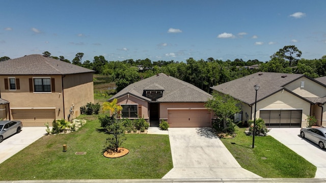 6449 NW Castlebrook Ave, Port Saint Lucie, FL 34983 - view of front of home featuring an attached garage, stucco siding, driveway, and a front yard