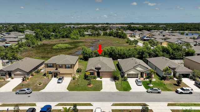 6449 NW Castlebrook Ave, Port Saint Lucie, FL 34983 - bird's eye view with a residential view