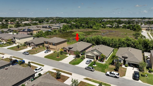 6449 NW Castlebrook Ave, Port Saint Lucie, FL 34983 - bird's eye view with a residential view