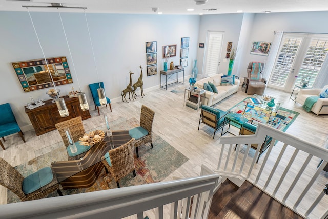 living area featuring wood finished floors and baseboards