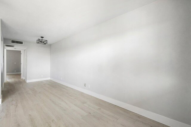 400 Village Green Cir W Unit 310, Palm Springs, FL 33461 - interior space featuring light wood finished floors, baseboards, and ceiling fan